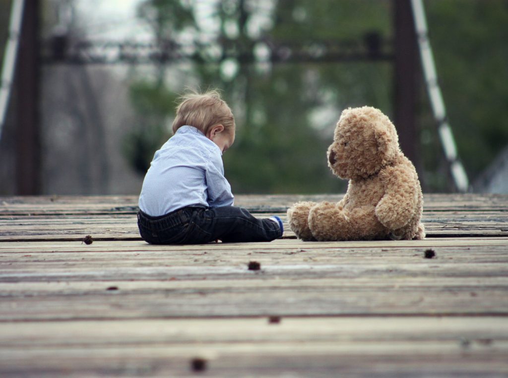 toddler with toys